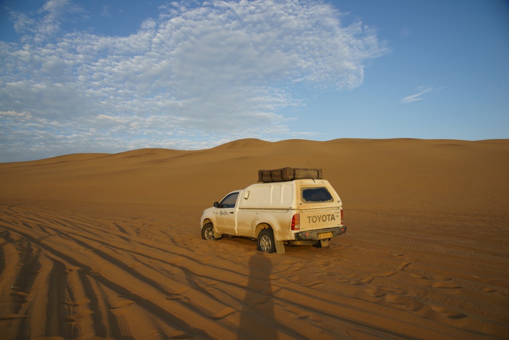 If you are driving through deep sand, let some air out of your tires. This will help you navigate through without getting stuck. 