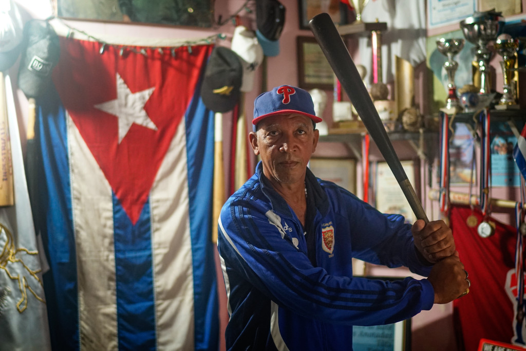 Jose Luis Bos Rodriguez has turned his home into a baseball museum, celebrating the rich history of the sport in Cuba. Photographed with a Tamron 35mm f/1.8 at 1/40 seconds.