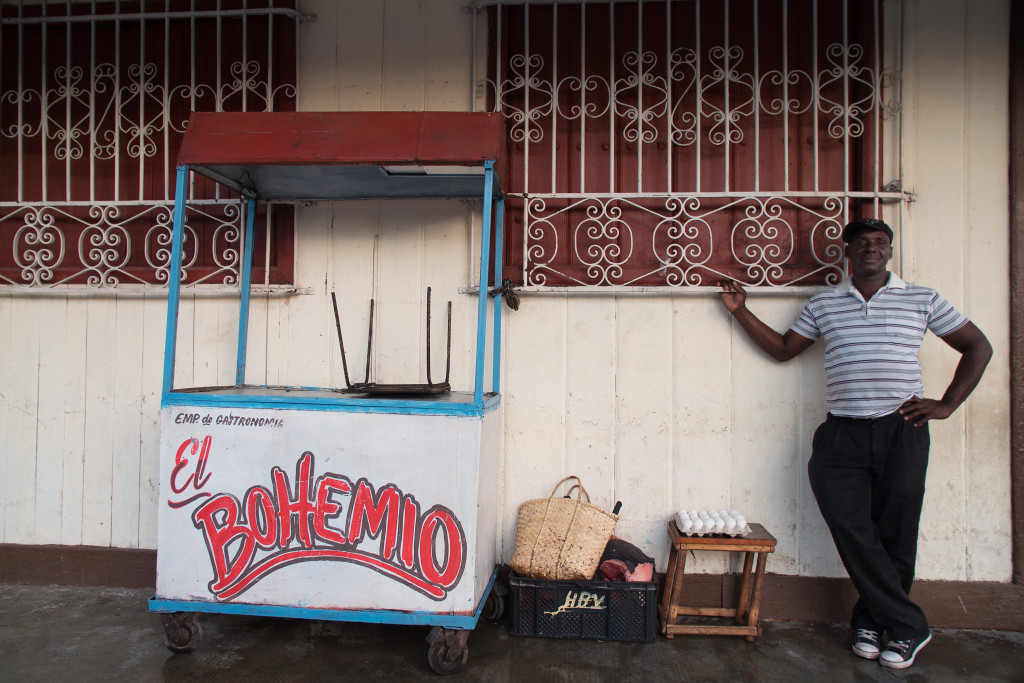 The owner of the food cart El Bohemio packs up after a full day selling food on the streets of Ciefo De Avila. Photographed on a Tamron 24-70 f/2.8 at 1/80 seconds and f/2.8.