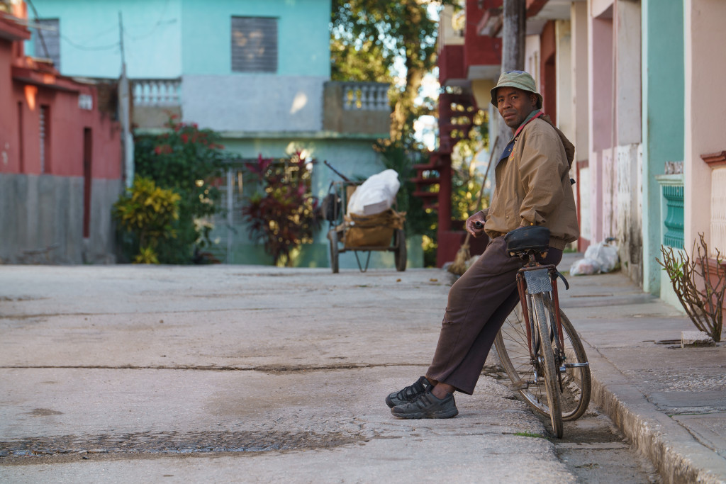 A man sits on his bike in the early morning hours in Sancti Spiritus. Photographed with a Tamron 70-200 at 1/80 and f/5.