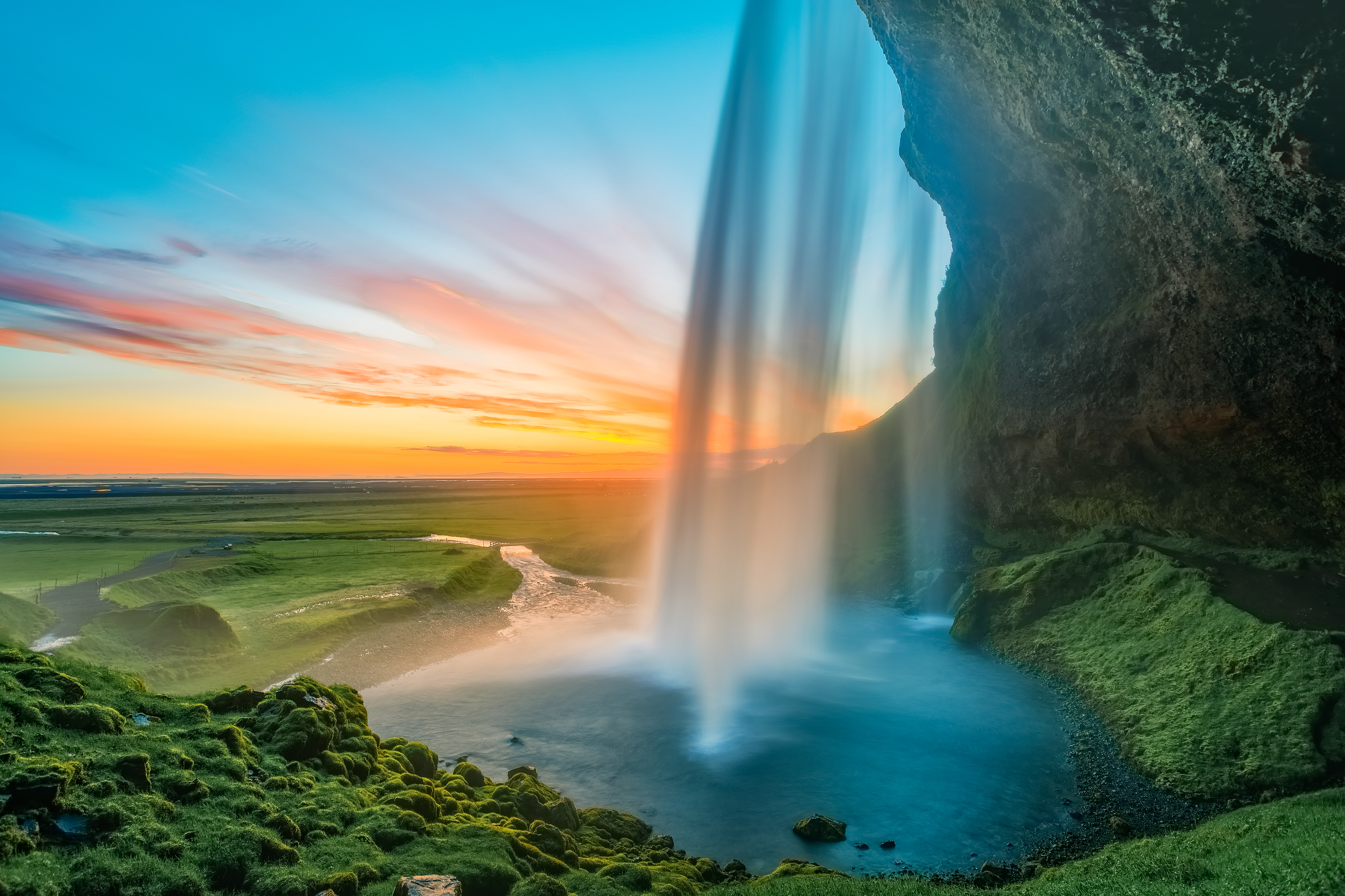 Водопад рассвет. Водопад Сельяландсфосс Исландия. Водопад Сельяландсфосс, Исландия закат. Водопад на рассвете. Водопад в горах.